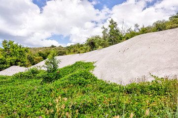 Tortola, British Virgin Islands - March 27, 2024: A pile of white sand behind the Bight on Norman Island
