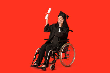 Beautiful female graduate student in wheelchair with graduation cap and diploma talking by mobile...