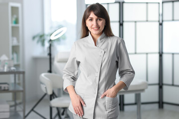 Cosmetologist in medical uniform in modern clinic