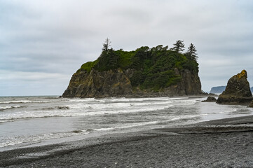 beach and large rock island