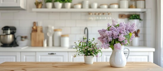 A modern kitchen counter displaying two elegant vases filled with colorful flowers