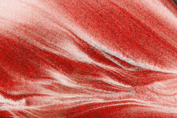 Abstract dust of pigment sparkling with red fluid color