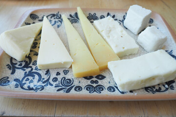Cheese platter with different kinds of cheese