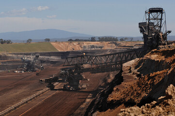 Opencut mining for brown coal at Loy Yang 2 in the Latrobe Valley Victoria. Huge dredgers cut into the mine to bucket the coal.