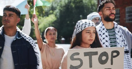 War, protest and sign to stop with woman in city for justice and crowd with support of Palestine. Angry, activist and rally for genocide with group of people to call attention to conflict for change