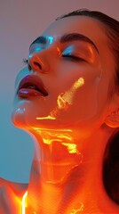 Model experiencing an innovative light therapy treatment