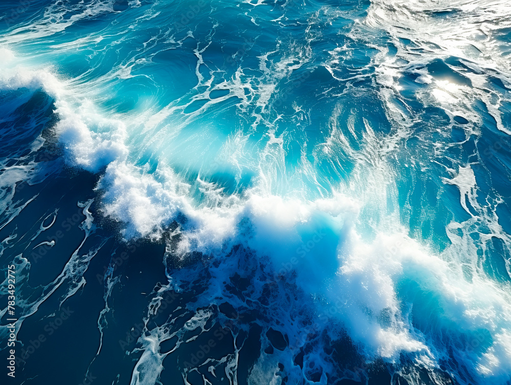 Poster ocean waves captured from above, showing the dynamic motion of water on a clear day, illustrating th