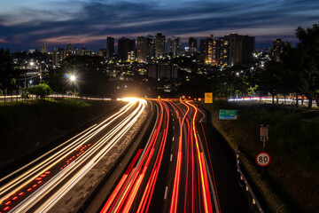 Trail of light caused by vehicular traffic in SP-294, Comandante Joao Ribeiro Barros Highway with...