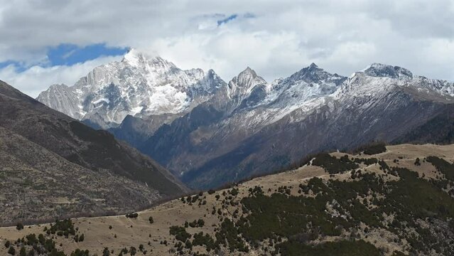 Time-lapse of Mount Siguniang with cloud flowing in Aba, Sichuan , China.