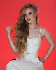 Portrait young woman dressed in white sculpted corset top. Headshot female model from Generation Z