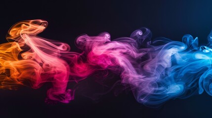 Fototapeta premium colored smoke isolated on black background
