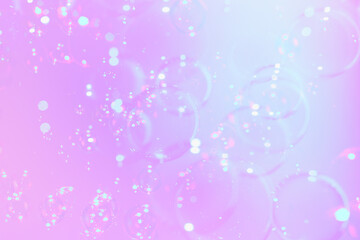 Beautiful Transparent Shiny Soap Bubbles Floating on Pink Background. Celebration Festive Backdrop. Pink Textured. Freshness Soap Suds Bubbles Water.	
