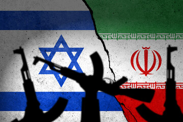 Flags of Israel and Iran painted on the concrete wall
