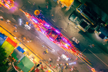 Aerial view of the parade in traditional buddhist festival at night 