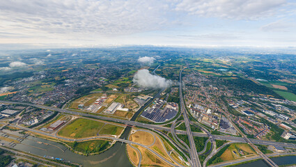 Ghent, Belgium. Industrial area. Panorama of the city. Summer day, cloudy weather. Aerial view