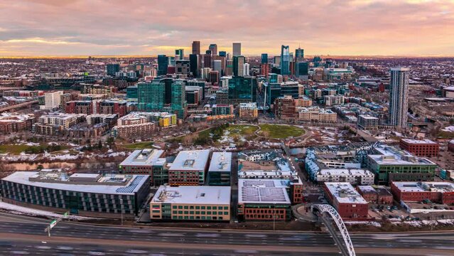View of the city during golden hour with melted snow, spring season, aerial hyperlapse, Denver, Colorado, 4K