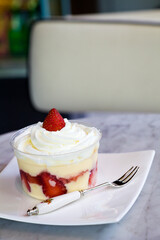 Homemade fresh strawberry mousse dessert on a table.