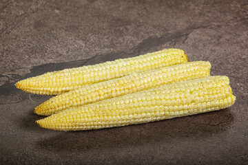 Raw sweet baby corn heap