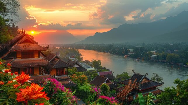 An awe-inspiring view of the iconic Mount Phousi at sunset, with diverse tourists making the climb for panoramic views of Luang Prabang