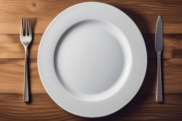 An empty plate and fork on a wooden table, viewed from above, with a pristine white plate and a textured warm oak table.