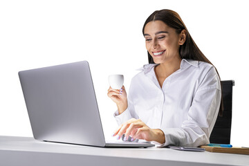 A smiling woman holding a coffee cup while working at a laptop on a white table, isolated on a white background, concept of business