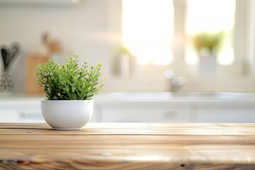 Blurred Kitchen Background with a Wooden Table Top for Product Display and Space on the Left Side. Concept of a Clean Modern Home Interior with Morning Light from the Window. Close Up View. 