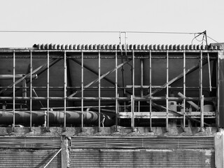 abandoned factory ruins in black and white - 783560577