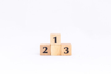 A podium made with wooden blocks on a white background