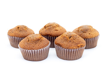 Fresh muffins chocolate cakes on white isolated background