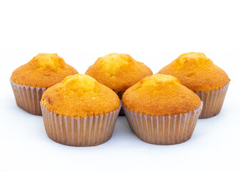 Fresh homemade cupcakes on white background.