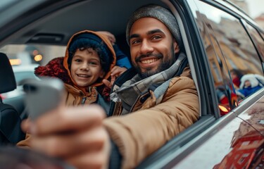Portrait of cute kid and father looking out of car window and smiling happily sitting in the car