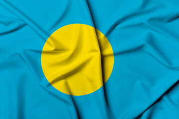 Beautifully waving and striped Palau flag, flag background texture with vibrant colors and fabric background