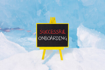 Successful onboarding symbol. Concept words Successful onboarding on beautiful yellow black blackboard. Beautiful blue ice background. Business successful onboarding concept. Copy space.