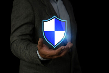 Businessman is holding a cybersecurity icon. Cyber security  internet security or information...