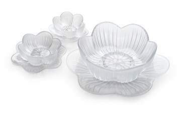 Set of  Crystal bowls with under plates with Anemone Flower design isolated on white background 