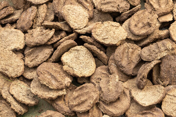 Cow dung cakes used as organic manure and for cooking in clay ovens in most villages of Bangladesh....