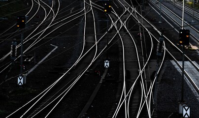 Station with the railways on a black road taking to different directions