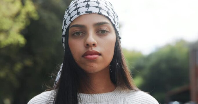 Portrait, protest and keffiyeh for female activist, justice and support for Palestine. Freedom, community and political demonstration for human rights, liberation or solidarity for Middle East