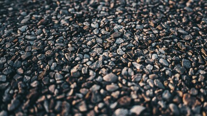Closeup shot of small stones on the beach