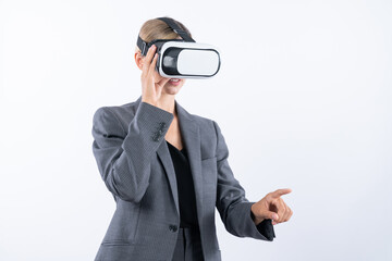Professional female leader touching at program or working while using VR glasses. Skilled...