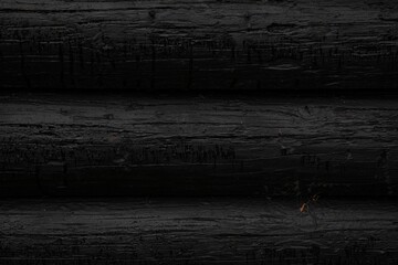 wooden logs painted in black,wa