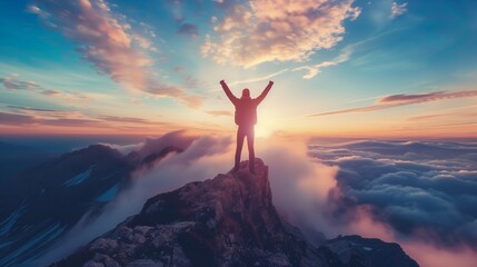 a person standing on top of a mountain with their arms in the air - obrazy, fototapety, plakaty