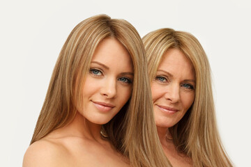 Blonde models. Young and old woman on white background. Aging, cosmetology, plastic surgery and retouching before and after concept - 783647399