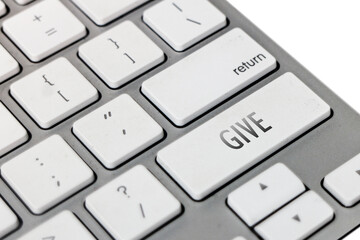 Closeup shot of a word Give on a laptop keyboard