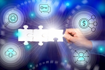 Hand Holding Jigsaw Puzzle Piece Unlocking New Futuristic Technologies.