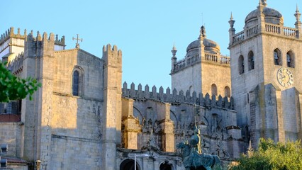 Fototapeta na wymiar Scenic shot of the Roman church Porto in Portugal with beautiful stone architecture and sunlight
