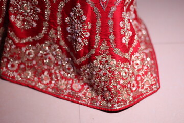 red bridal lehenga with intricate chumki work- an indian bridal wear