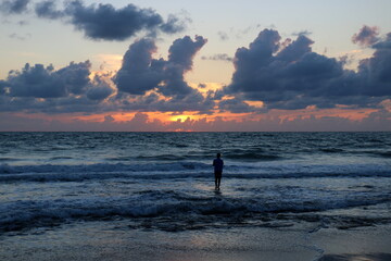 Lighting and color of the sky above the horizon at sunset.