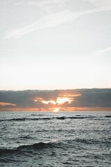 Beautiful view of sea waves against a sunset sky background