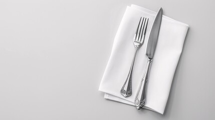 Clear blank napkin mockup with utensils isolated. Silverware beside translucent cloth towel template. Cafe emblem on top for logo creation.